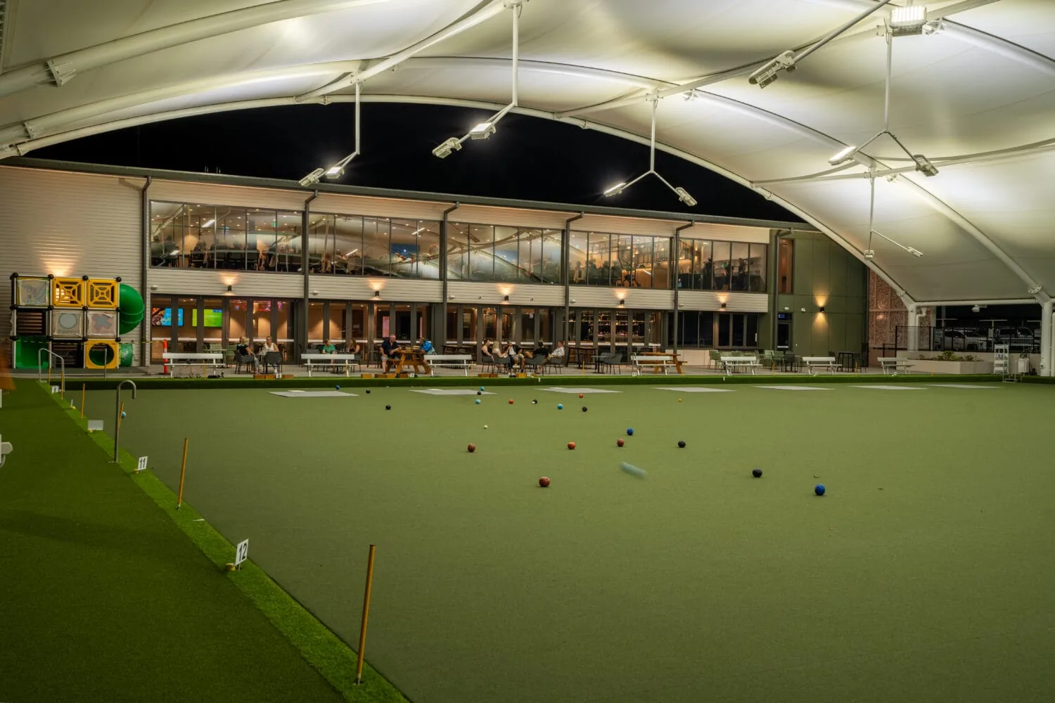 Bowler on the green at Club Helensvale
